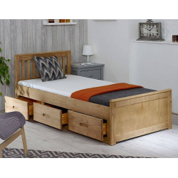 Single bed with storage featuring wooden frame and mattress.
